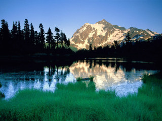 Mountain range reflection lake forest 13 - a forest in the background free wallpaper