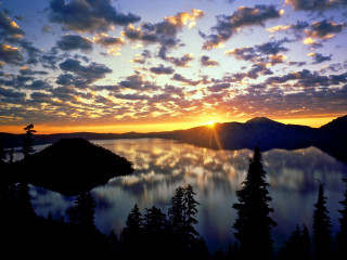 Sunset lake trees mountains clouds - a sunset over a lake free wallpaper