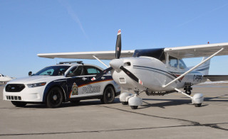 Police car small plane airport - the tarmac free wallpaper