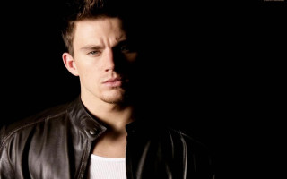 Man leather jacket serious look 11 - a dark room free wallpaper