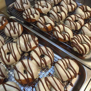 Chocolate drizzled donuts trays food - free holidays wallpaper for tablet