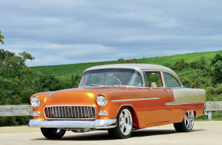 Orange white car parked street - dee whitcomb free wallpaper