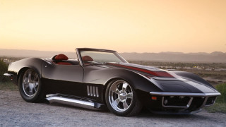 Black sports car sunset mountains - ed roth free wallpaper