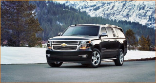 Black suv mountain range snow - a black suv free wallpaper