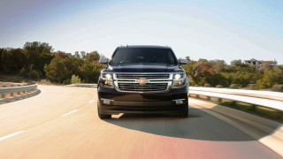 Black truck driving road forest - a black truck free wallpaper