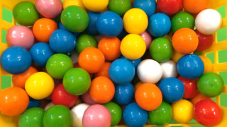 Yellow basket colorful balls different - image free wallpaper