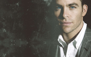 Man suit tie posing picture 2 - a black background behind free wallpaper