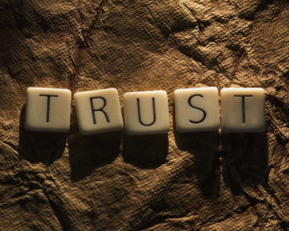 Trust scrabble tiles rock surface - a word free wallpaper