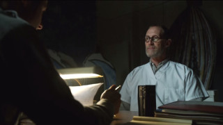 Man sitting desk book lamp - side and a person free wallpaper