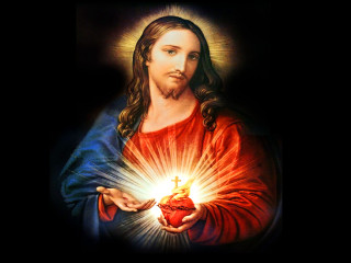 Jesus holding heart light shining - radiant free wallpaper for desktop