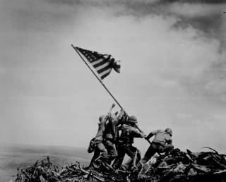 Men raising flag hill rubbles 2 - the flag free wallpaper