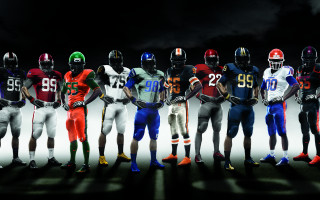 Football players standing helmets hands 2 - helmet free wallpaper for desktop