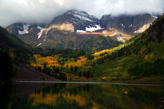 Mountain lake forest yellow green - a lake in the foreground and a forest in the background free wallpaper