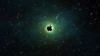 Apple logo space stars green 2 - a green light in the middle free wallpaper