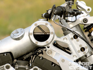 Motorcycle engine closeup blurry background - accurate free wallpaper