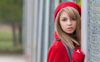 Woman red coat fence red - a red coat free wallpaper
