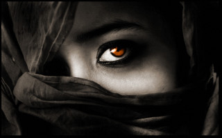 Woman orange eyes scarf serious 2 - egyptian art free wallpaper