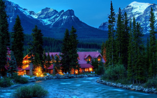 Mountain resort river nighttime lights - a mountain in the background free wallpaper