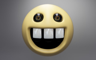 Yellow smiley face three eyes - a yellow smiley face free wallpaper
