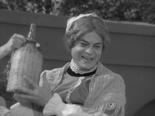 Woman holding bottle glass smiling - a woman in the background free wallpaper