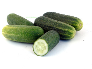 Cucumbers half cut middle white - a white surface free wallpaper