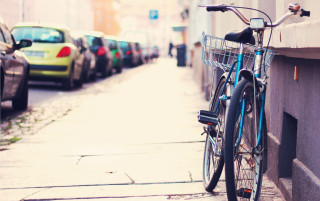 Bicycle parked street building cars - a bicycle free wallpaper for desktop