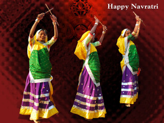 Colorful dresses dancing women sticks - a couple of women free wallpaper