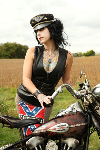 Woman leather outfit motorcycle field - a flag free wallpaper for mobile