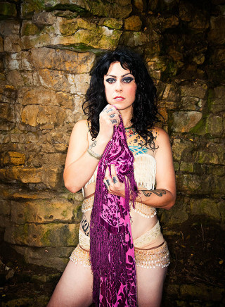 Woman purple costume scarf face - a stone wall free wallpaper