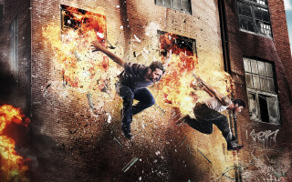 Man jumping skateboard building fire - fire and smoke free wallpaper