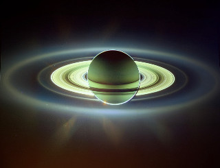 Saturn ring sunbeam space art - a sunbeam in the background free wallpaper