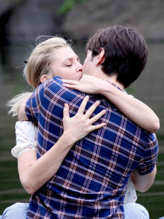 Man woman hugging grass pond - free love wallpaper for mobile