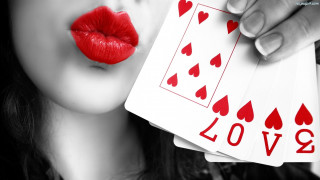 Woman holding playing card red - a red lipstick free wallpaper