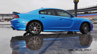 Blue sports car rainy day - a rainy day free wallpaper