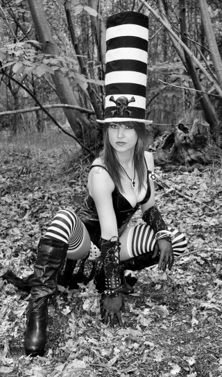 Woman striped hat boots kneeling - alice mason free wallpaper for mobile