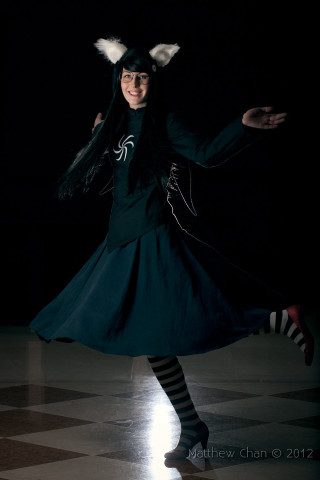 Dancing woman cat costume checkered - floor free wallpaper for mobile