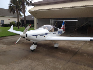 Small airplane parked house flag - front view free wallpaper