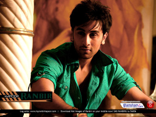 Man green shirt tie sitting - his arm free wallpaper