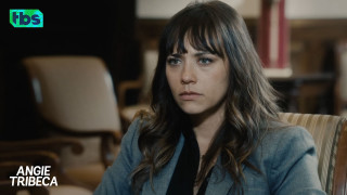 Woman sitting serious look chair - a chair in the background free wallpaper