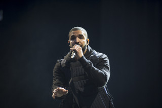 Man black jacket holding microphone - a black jacket holding free wallpaper