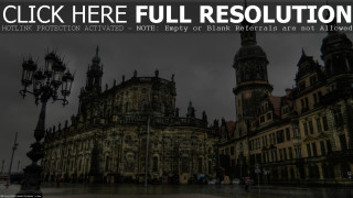 Large building clock tower dark - a dark sky in the background free wallpaper