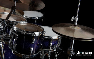 Drum set closeup black background - rim light free wallpaper