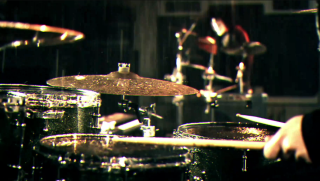 Drummer dark room microphone light - a person playing free wallpaper