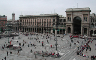 City square clock tower gathering - a clock tower in the background free wallpaper