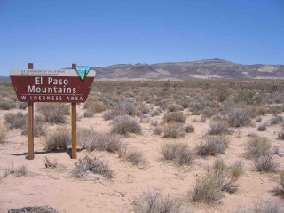Desert sign mountains blue sky - free forest wallpaper for desktop