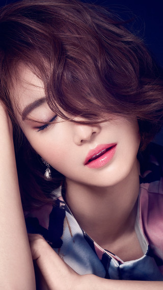 Woman closedeyes handonshoulder dressshirt earrings - photorealistic free wallpaper for mobile