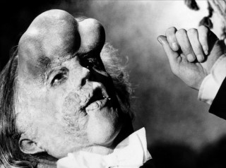 Man tie suit cigarette looking - holding free wallpaper for desktop