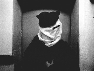 Person hat scarf sitting corner - chiharu shiota free wallpaper