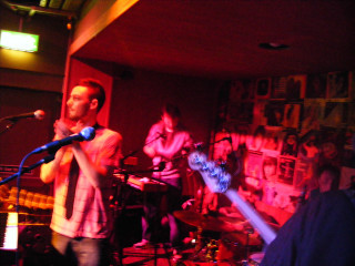 Band microphone keyboard man glowing - room free wallpaper