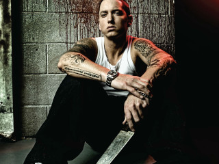 Tattooed man knife brick wall - eamon everall free wallpaper